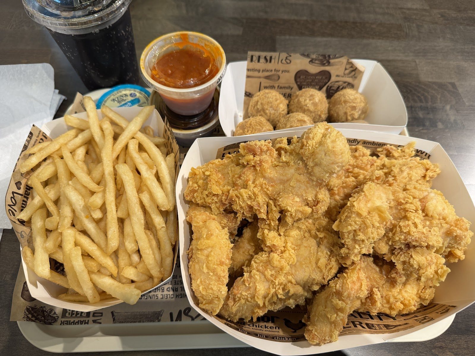 Fried chicken and fries at bhc Chicken's Arlington restaurant